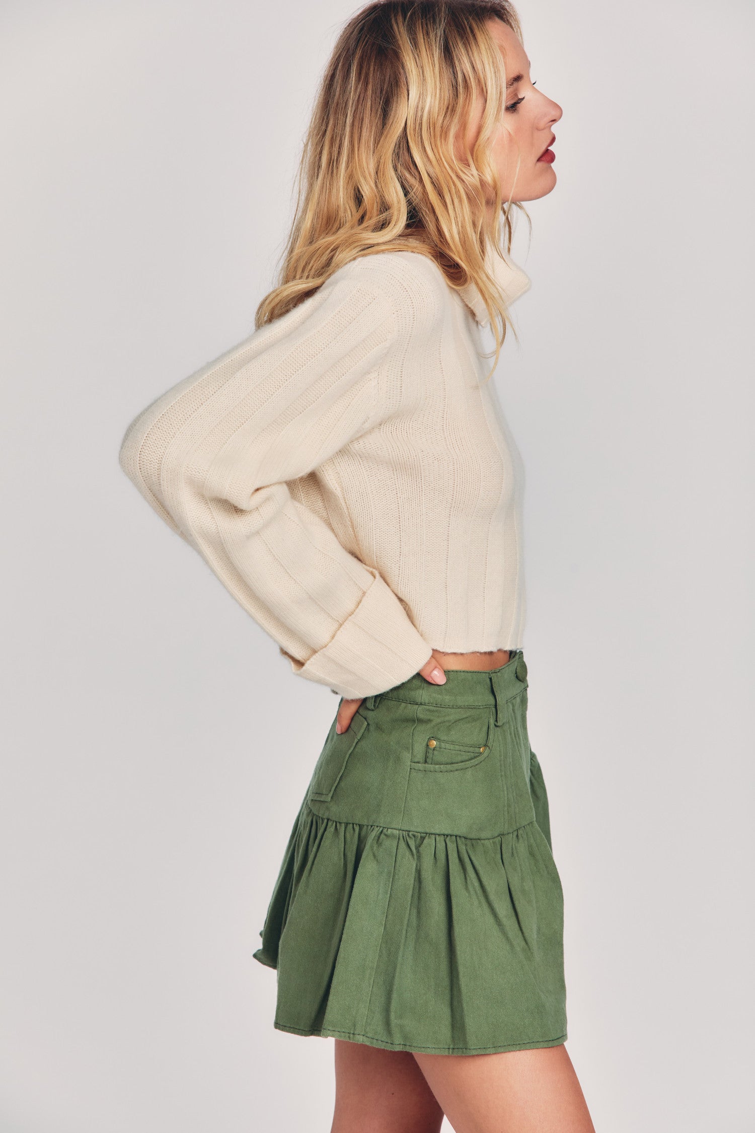 Women's green mini skirt in denim-like cotton