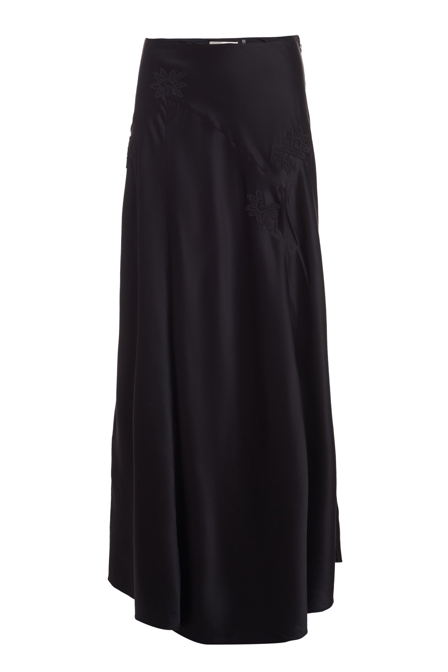 Black silk long skirt with lace motif douses around the yolk and a fixed waist above an off-center, enlarged, zigzag seam detail. Below, the piece flows to the ankle with a slit on the wearer’s left.