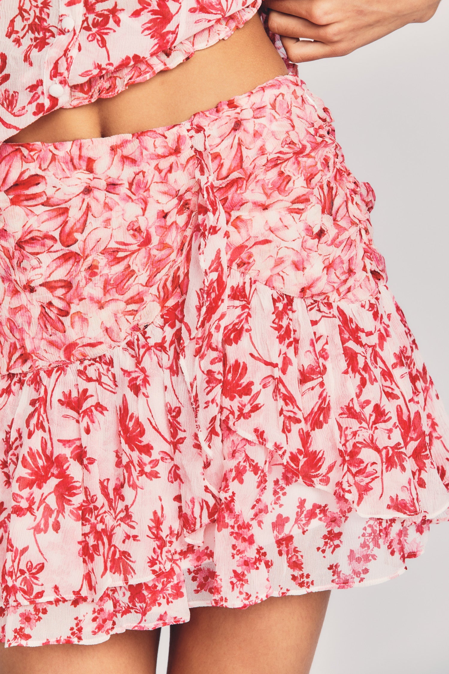 Womens red floral print mini skirt with ruffle detailing