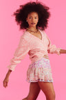 Womens silk floral print mini skirt with a fixed waist and ruffle detailing