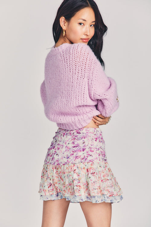 Womens silk floral print mini skirt with a fixed waist and ruffle detailing