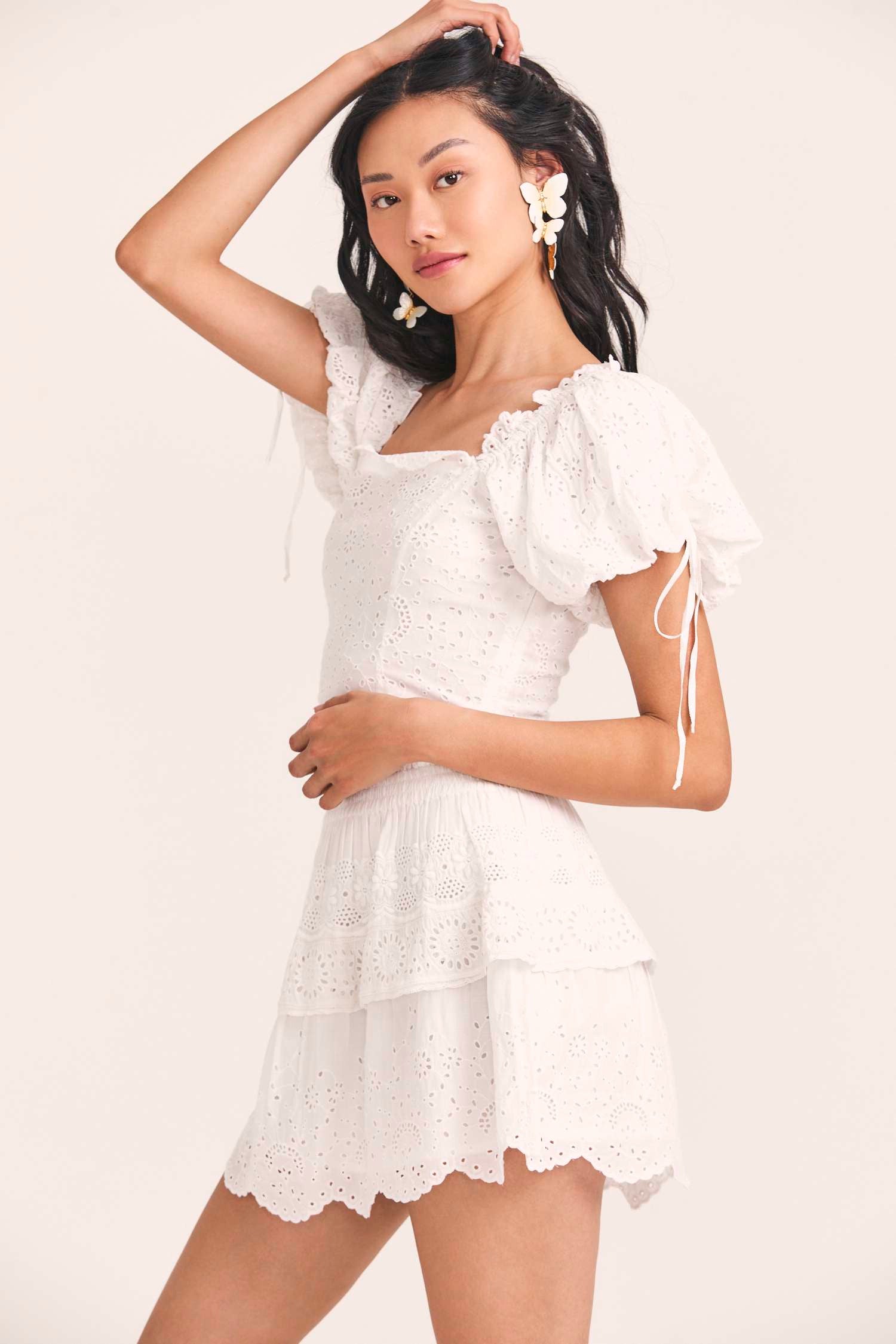 Women's white floral eyelet embroidered skirt with a short lace-trimmed flounce