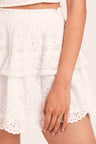 Women's white floral eyelet embroidered skirt with a short lace-trimmed flounce
