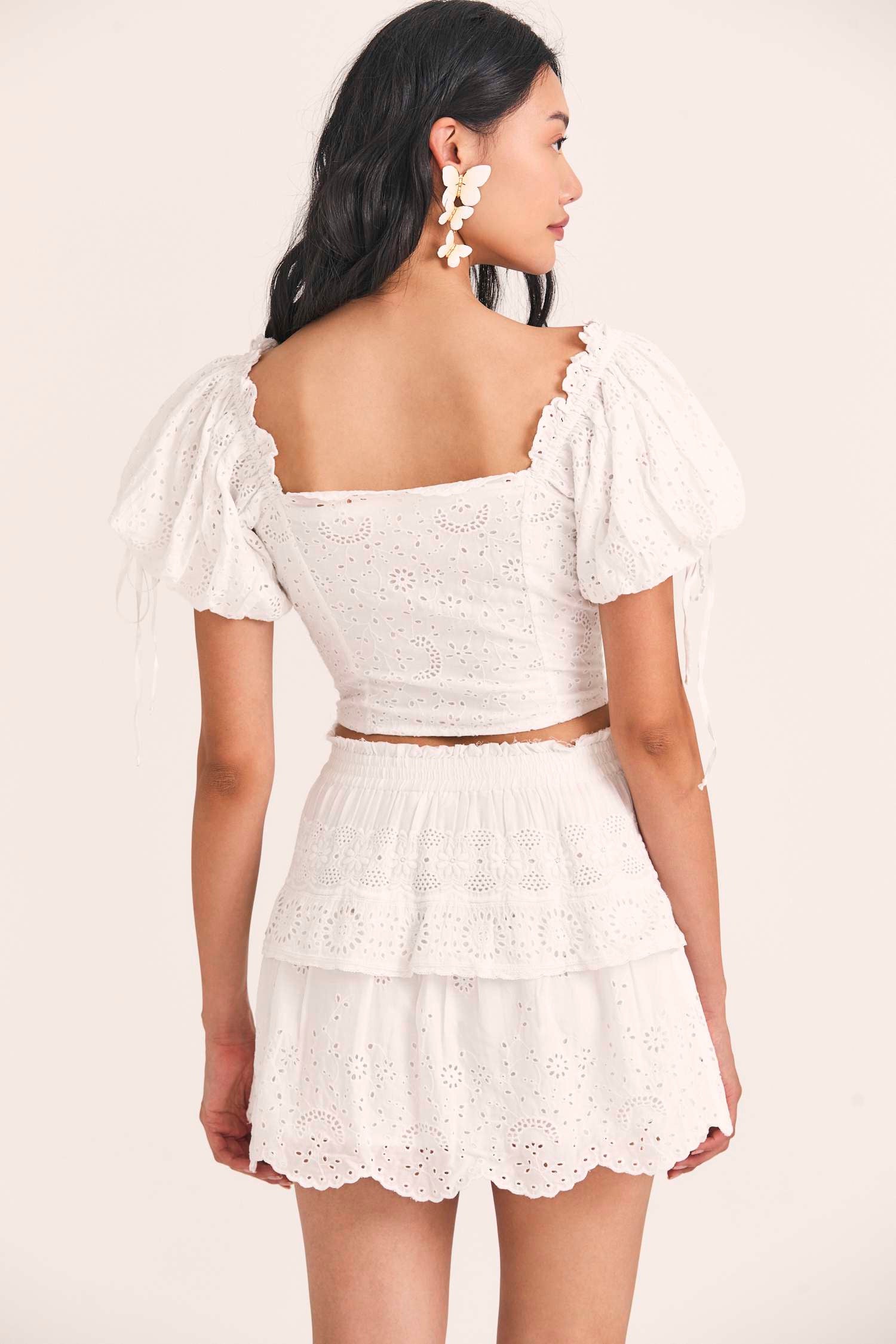 Women's white floral eyelet embroidered skirt with a short lace-trimmed flounce