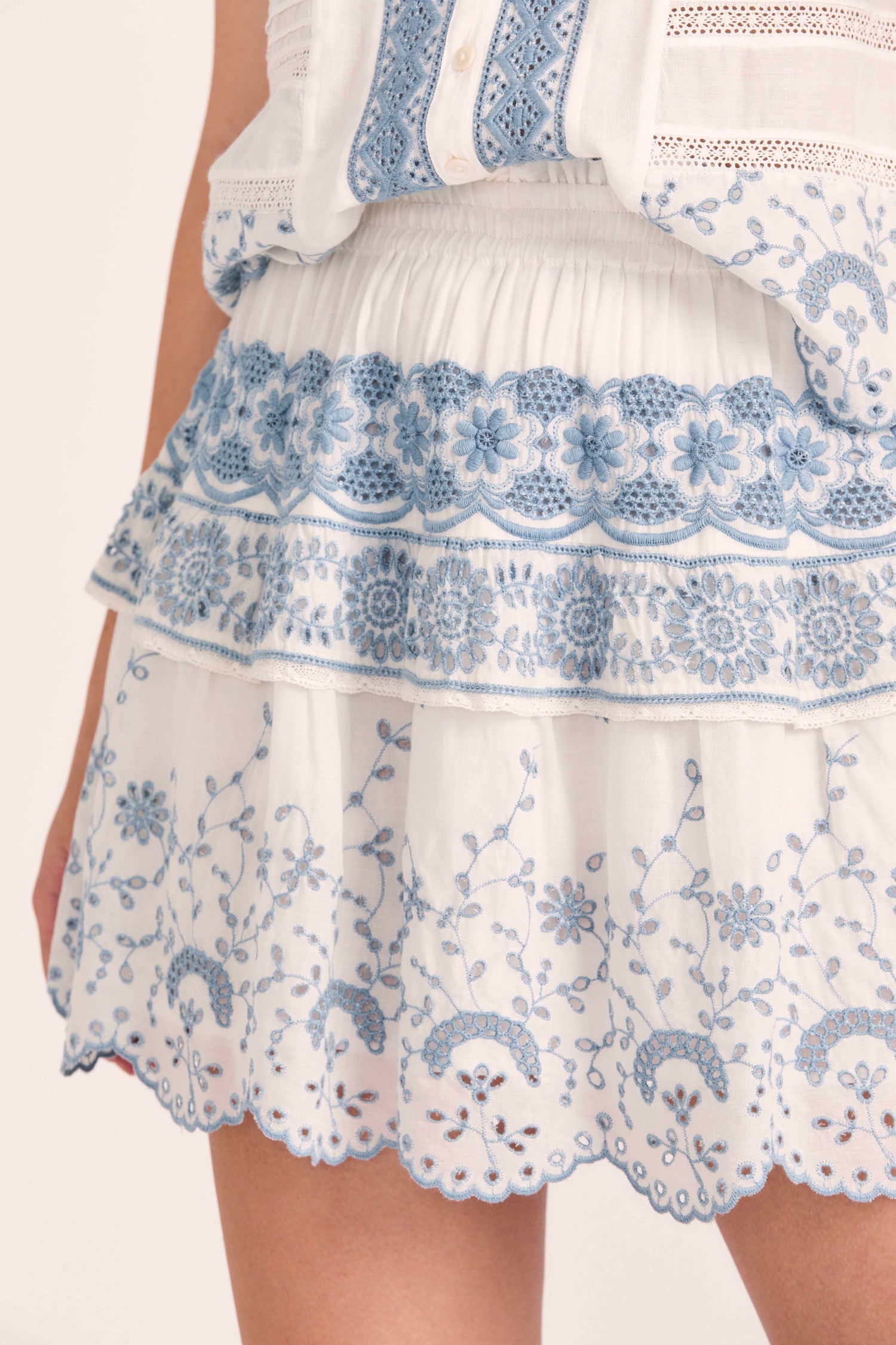 Women's white and blue embroidered floral eyelet mini skirt