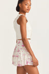 Womens ruffle mini skirt with magenta floral print and lace detail