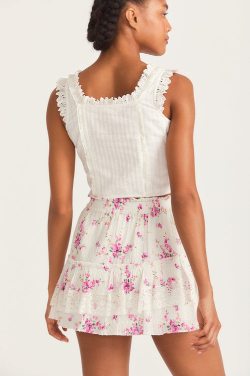 Womens ruffle mini skirt with magenta floral print and lace detail