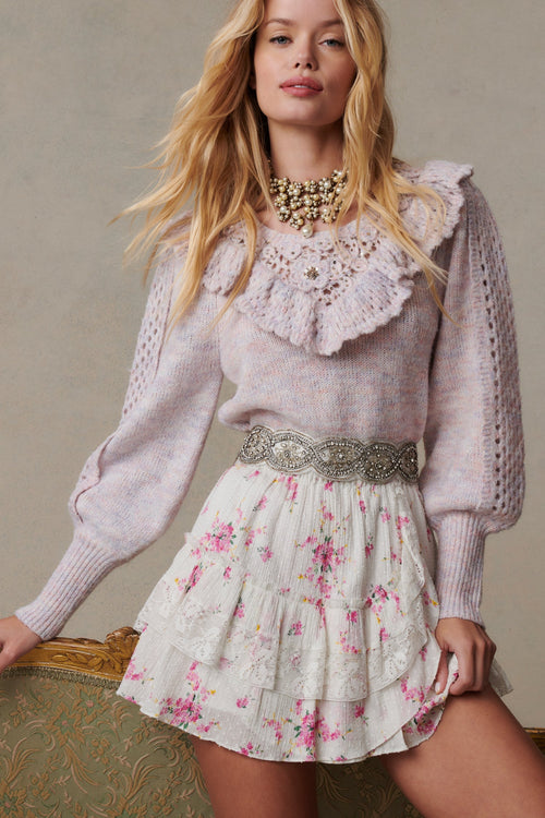 Womens ruffle mini skirt with magenta floral print and lace detail