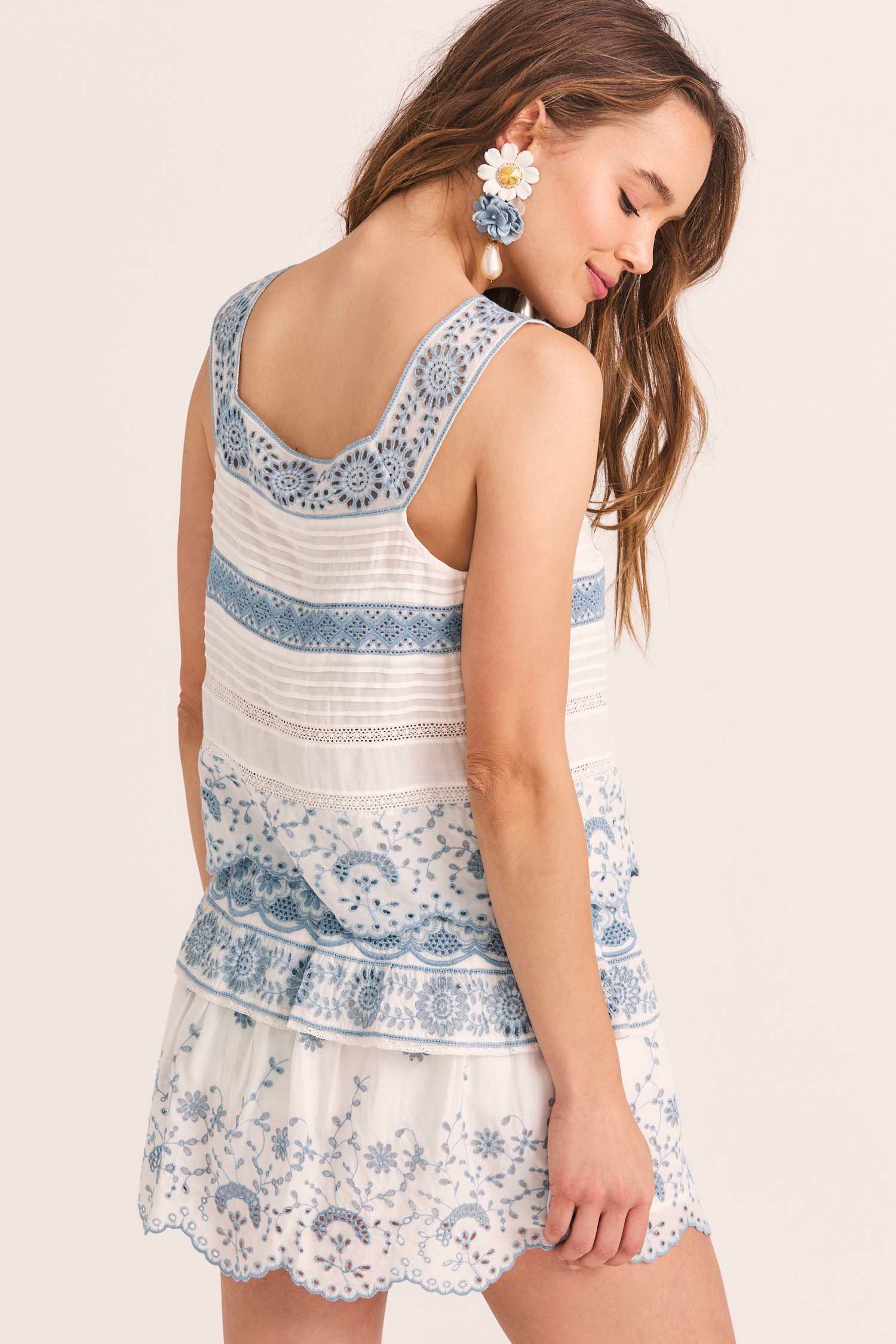 Women's white and blue embroidered top