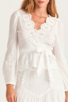 Womens white wrap top with custom embroidery detailing