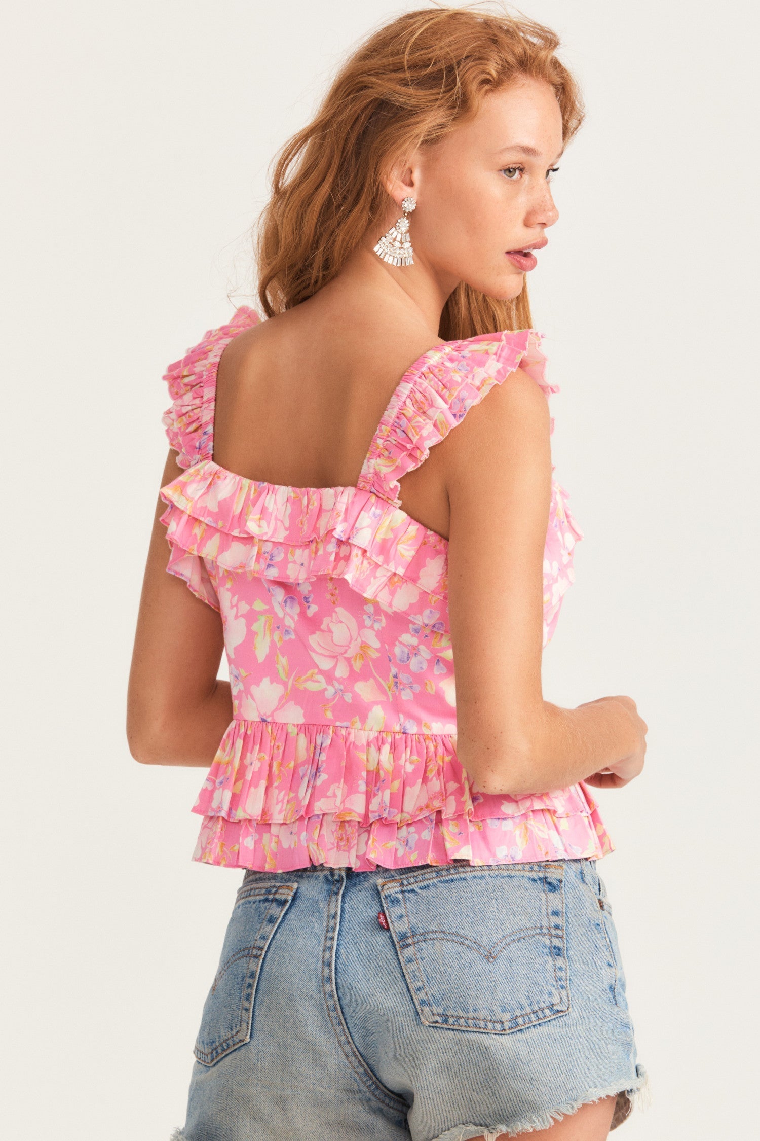 Womens pink ruffle tank top with ruffle trim and ruffle straps