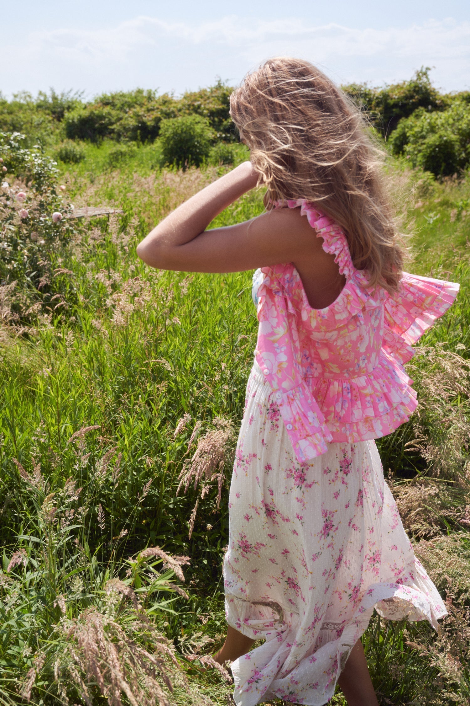 Womens pink ruffle tank top with ruffle trim and ruffle straps