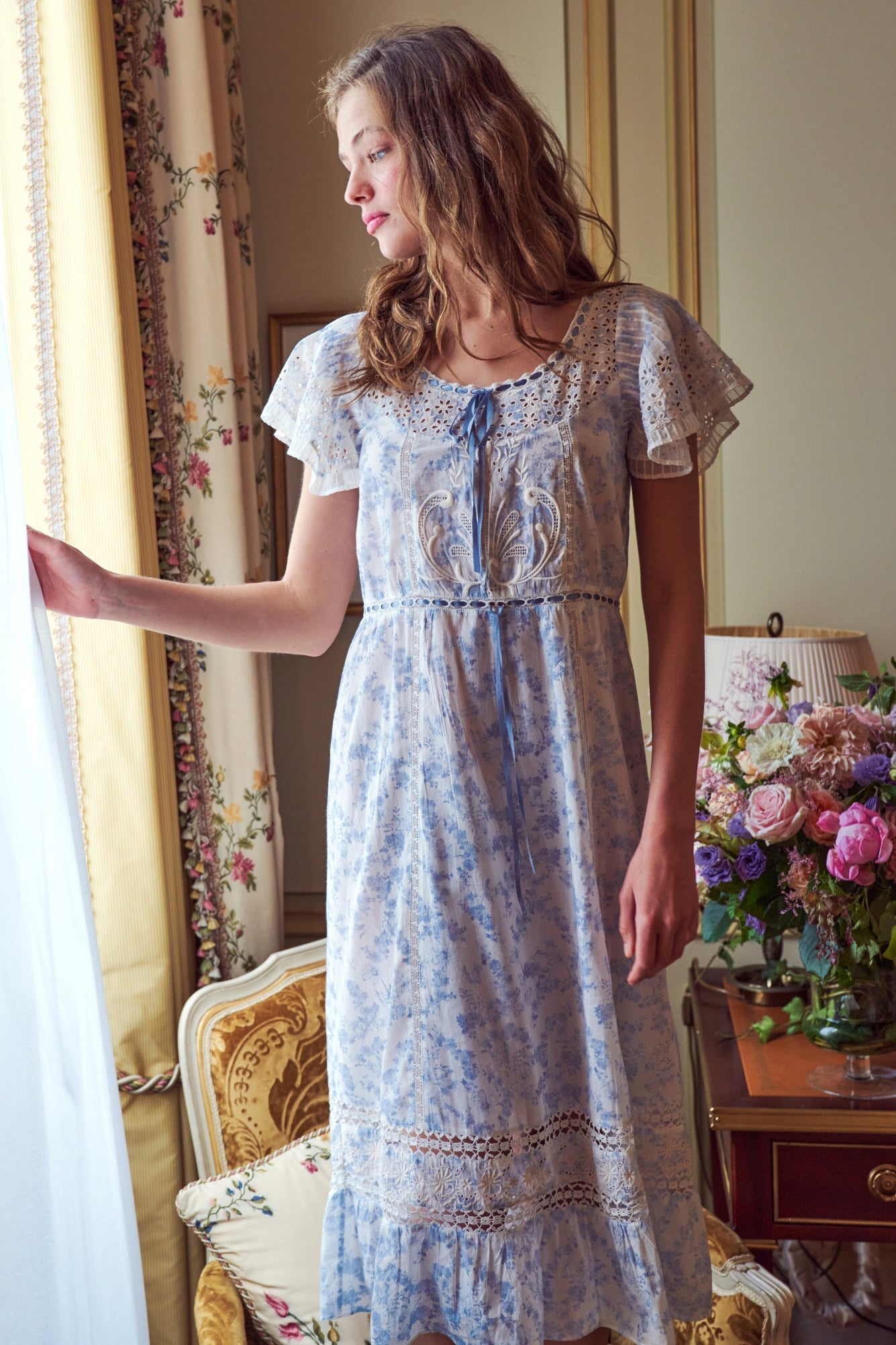 Womens light blue faded floral print midi dress with embroidery and lace detailing and ruffle sleeves