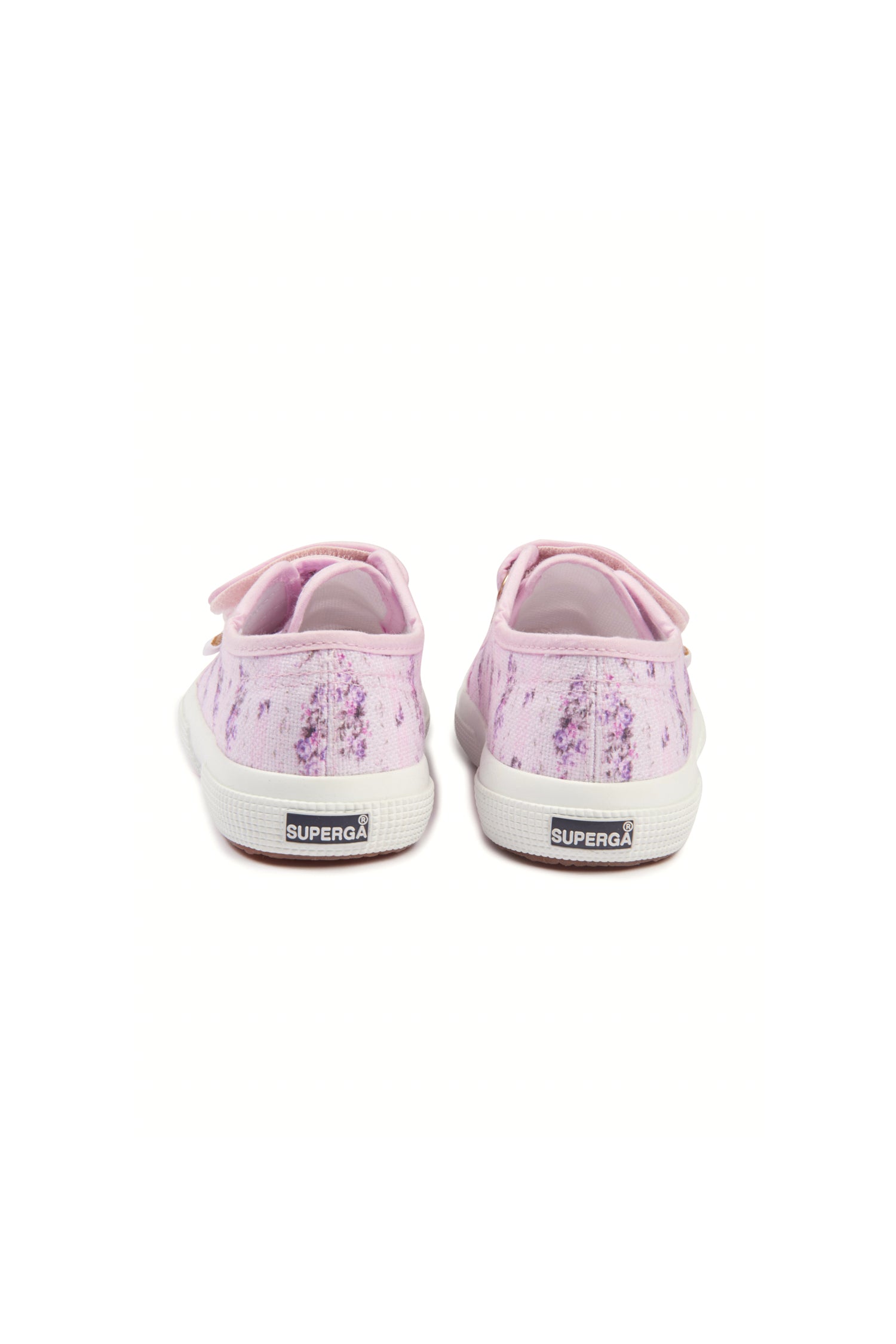 Pink sneakers with florals on printed cotton, and gold-tone eyelet details and velcro straps. 