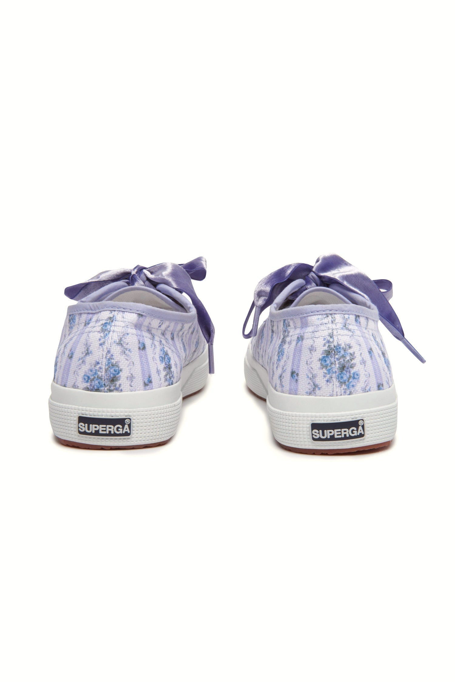 Pastel purple/lilac sneaker with floral pattern on printed cotton, gold-toned eyelet details, and purple velvet laces.