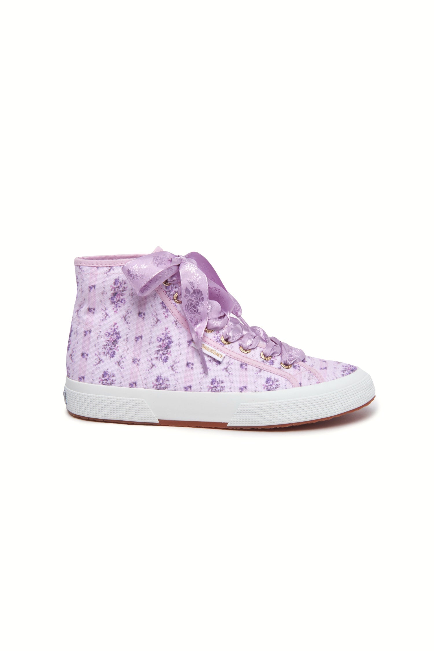 Purple hightop sneakers with florals on printed cotton with purple satin laces, and gold-tone eyelet details.