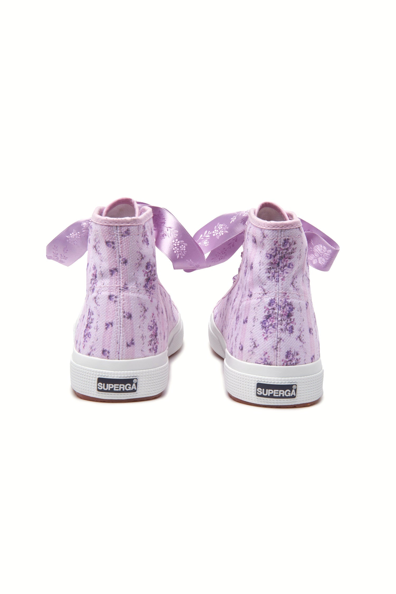 Purple hightop sneakers with florals on printed cotton with purple satin laces, and gold-tone eyelet details.