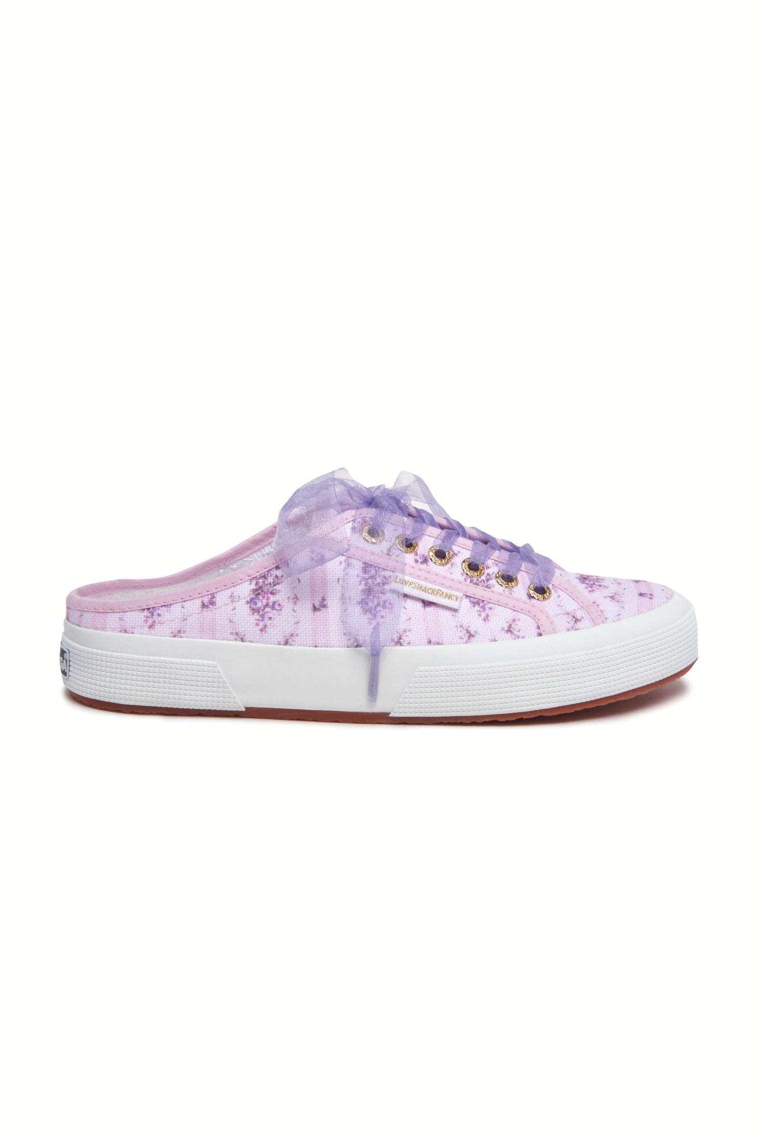 Purple mule sneakers with florals on printed cotton with purple tulle laces, and gold-tone eyelet details.