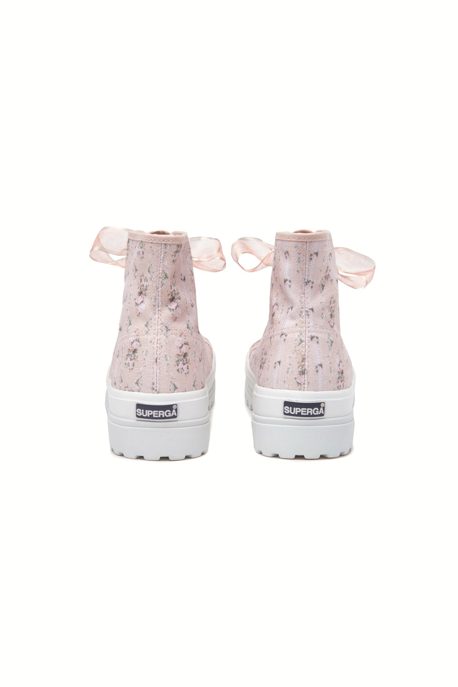 Pink hightop sneakers with florals on printed cotton with pink tulle laces, and gold-tone eyelet details.