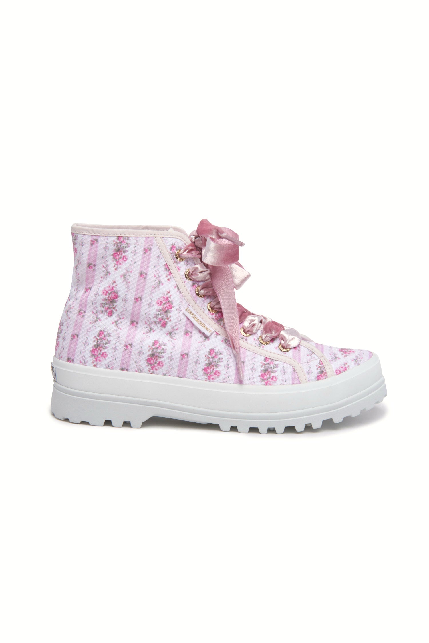 Pink hightop sneakers with florals on printed cotton with pink velvet laces, and gold-tone eyelet details.