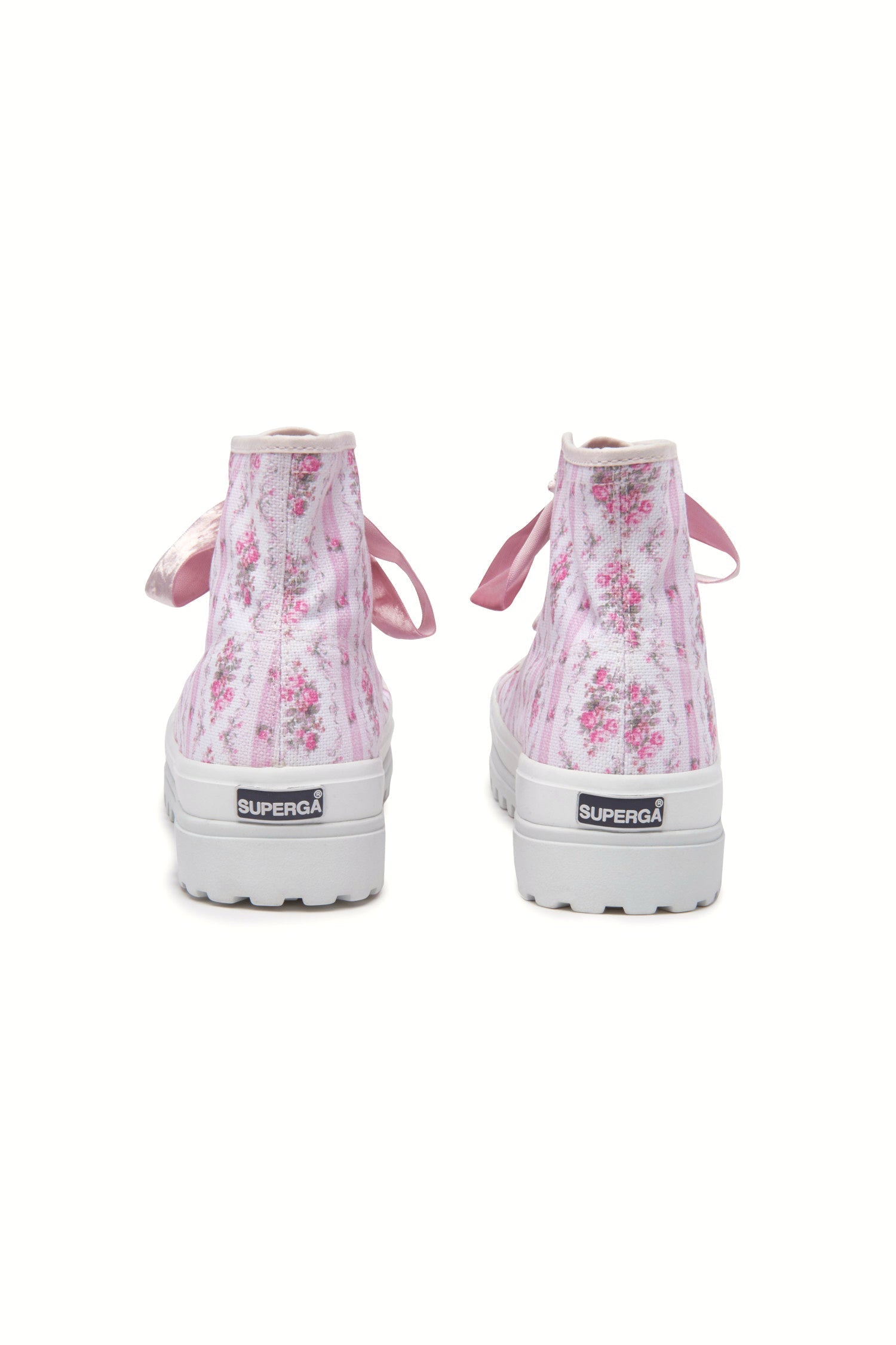 Pink hightop sneakers with florals on printed cotton with pink velvet laces, and gold-tone eyelet details.